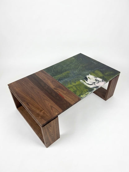 Handmade Fibonacci Coffee Table by Redline Design with a floating natural stone top in the golden ratio proportions, walnut frame, and open shelf base