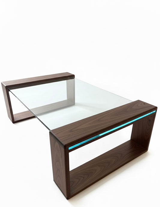 Handmade iJ-v1 Book Nook Glass Table by Redline Design with a 1/2 inch glass top floating on solid walnut frames that double as a bookshelf