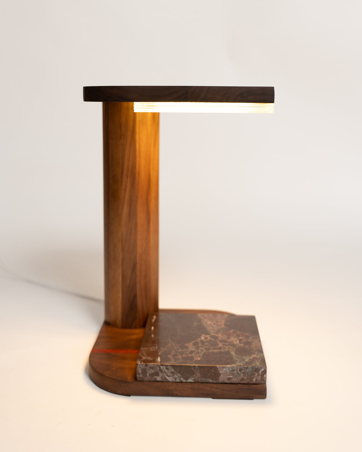 Handmade Sand & Stone Table Lamp by Redline Design in walnut with a green natural stone base and touch-sensitive redline dimmer